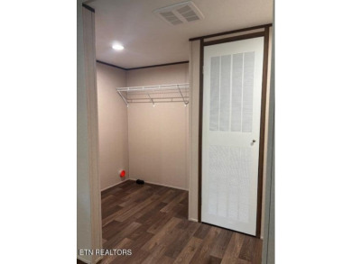 LOOK-BRAND NEW 2025 DOUBLE WIDE ON A CONCRETE BLOCK FOUNDATION on Lake Tansi Village Country Club in Tennessee - for sale on GolfHomes.com, golf home, golf lot