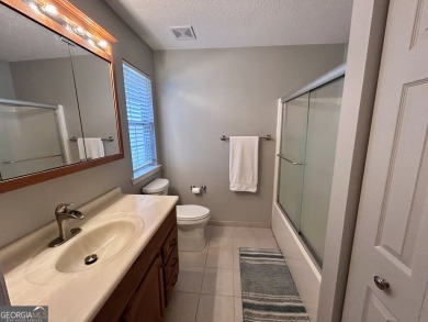 Charming, Updated Home on Private Greenbelt Lot in Peachtree on Canongate At Flat Creek Club in Georgia - for sale on GolfHomes.com, golf home, golf lot