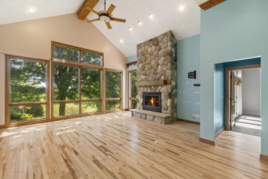 Custom-designed cedar home on over 7.5 acres with 600' of on Bear Lake Highlands Golf Course in Michigan - for sale on GolfHomes.com, golf home, golf lot