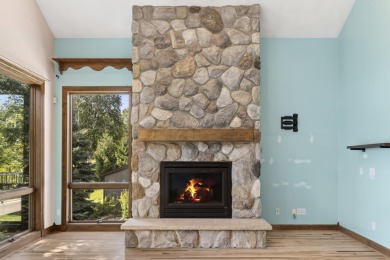 Custom-designed cedar home on over 7.5 acres with 600' of on Bear Lake Highlands Golf Course in Michigan - for sale on GolfHomes.com, golf home, golf lot