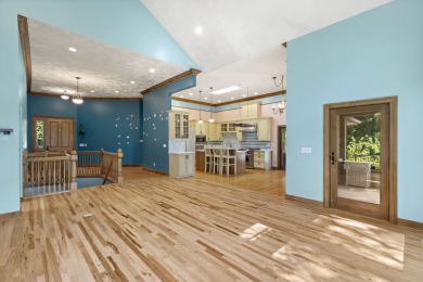 Custom-designed cedar home on over 7.5 acres with 600' of on Bear Lake Highlands Golf Course in Michigan - for sale on GolfHomes.com, golf home, golf lot
