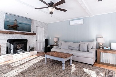 Located in the coveted Warwick Neck, this exceptional 4-bedroom on Warwick Country Club in Rhode Island - for sale on GolfHomes.com, golf home, golf lot