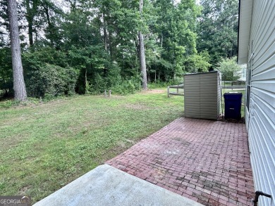 Charming, Updated Home on Private Greenbelt Lot in Peachtree on Canongate At Flat Creek Club in Georgia - for sale on GolfHomes.com, golf home, golf lot