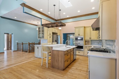 Custom-designed cedar home on over 7.5 acres with 600' of on Bear Lake Highlands Golf Course in Michigan - for sale on GolfHomes.com, golf home, golf lot