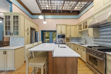 Custom-designed cedar home on over 7.5 acres with 600' of on Bear Lake Highlands Golf Course in Michigan - for sale on GolfHomes.com, golf home, golf lot