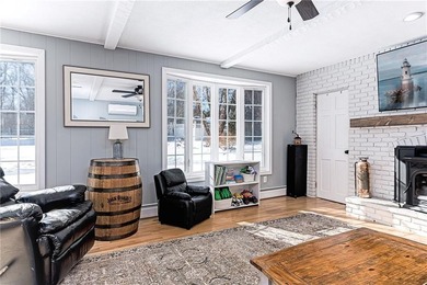 Located in the coveted Warwick Neck, this exceptional 4-bedroom on Warwick Country Club in Rhode Island - for sale on GolfHomes.com, golf home, golf lot