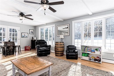 Located in the coveted Warwick Neck, this exceptional 4-bedroom on Warwick Country Club in Rhode Island - for sale on GolfHomes.com, golf home, golf lot