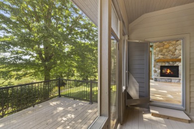 Custom-designed cedar home on over 7.5 acres with 600' of on Bear Lake Highlands Golf Course in Michigan - for sale on GolfHomes.com, golf home, golf lot