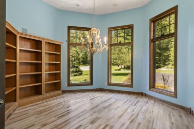Custom-designed cedar home on over 7.5 acres with 600' of on Bear Lake Highlands Golf Course in Michigan - for sale on GolfHomes.com, golf home, golf lot