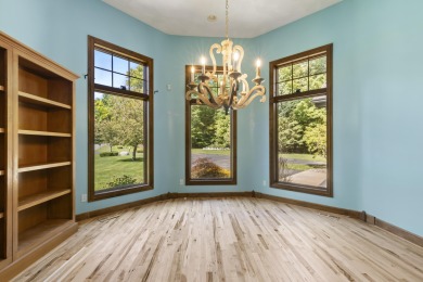 Custom-designed cedar home on over 7.5 acres with 600' of on Bear Lake Highlands Golf Course in Michigan - for sale on GolfHomes.com, golf home, golf lot