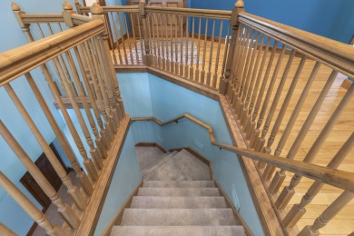 Custom-designed cedar home on over 7.5 acres with 600' of on Bear Lake Highlands Golf Course in Michigan - for sale on GolfHomes.com, golf home, golf lot