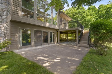 Custom-designed cedar home on over 7.5 acres with 600' of on Bear Lake Highlands Golf Course in Michigan - for sale on GolfHomes.com, golf home, golf lot