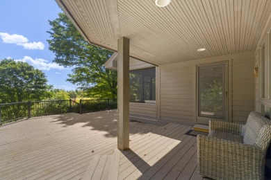 Custom-designed cedar home on over 7.5 acres with 600' of on Bear Lake Highlands Golf Course in Michigan - for sale on GolfHomes.com, golf home, golf lot