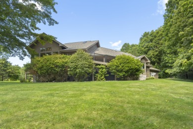 Custom-designed cedar home on over 7.5 acres with 600' of on Bear Lake Highlands Golf Course in Michigan - for sale on GolfHomes.com, golf home, golf lot