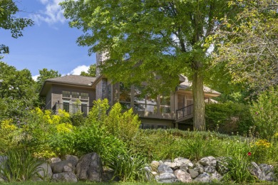 Custom-designed cedar home on over 7.5 acres with 600' of on Bear Lake Highlands Golf Course in Michigan - for sale on GolfHomes.com, golf home, golf lot