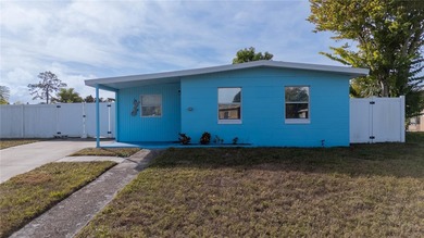 Charming bungalow situated on a quiet street in the heart of on Port Charlotte Golf Club in Florida - for sale on GolfHomes.com, golf home, golf lot