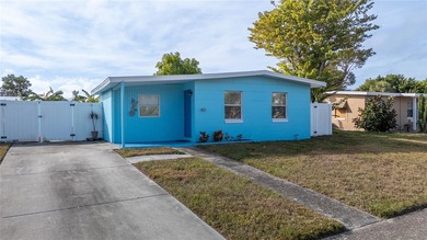 Charming bungalow situated on a quiet street in the heart of on Port Charlotte Golf Club in Florida - for sale on GolfHomes.com, golf home, golf lot