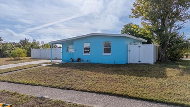 Charming bungalow situated on a quiet street in the heart of on Port Charlotte Golf Club in Florida - for sale on GolfHomes.com, golf home, golf lot