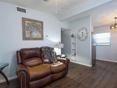 Charming bungalow situated on a quiet street in the heart of on Port Charlotte Golf Club in Florida - for sale on GolfHomes.com, golf home, golf lot