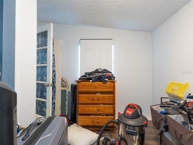 Charming bungalow situated on a quiet street in the heart of on Port Charlotte Golf Club in Florida - for sale on GolfHomes.com, golf home, golf lot