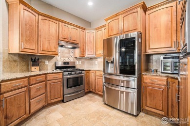 This custom built ranch home is nestled on a peaceful cul-de-sac on Highland Meadows Golf Course in Colorado - for sale on GolfHomes.com, golf home, golf lot