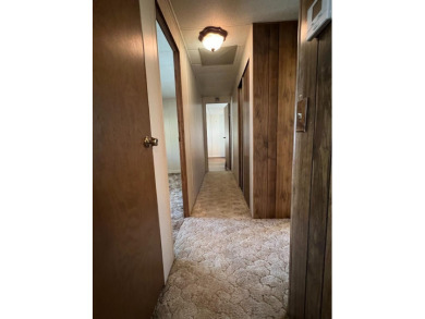 Discover comfort and convenience in this inviting 2-bedroom on Tucker Oaks Golf Course in California - for sale on GolfHomes.com, golf home, golf lot
