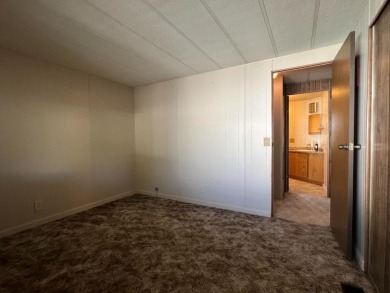 Discover comfort and convenience in this inviting 2-bedroom on Tucker Oaks Golf Course in California - for sale on GolfHomes.com, golf home, golf lot
