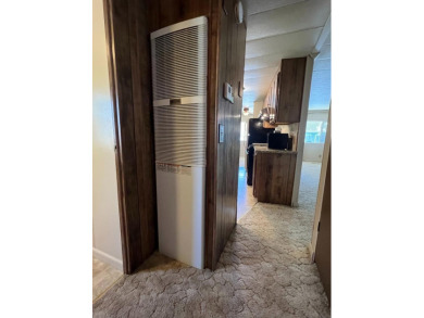 Discover comfort and convenience in this inviting 2-bedroom on Tucker Oaks Golf Course in California - for sale on GolfHomes.com, golf home, golf lot