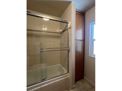 Discover comfort and convenience in this inviting 2-bedroom on Tucker Oaks Golf Course in California - for sale on GolfHomes.com, golf home, golf lot