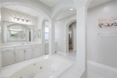 Welcome to this STUNNING two-story, three-car garage home in the on Valencia Golf and Country Club in Florida - for sale on GolfHomes.com, golf home, golf lot