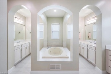 Welcome to this STUNNING two-story, three-car garage home in the on Valencia Golf and Country Club in Florida - for sale on GolfHomes.com, golf home, golf lot