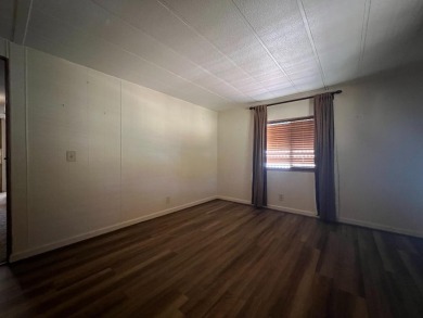 Discover comfort and convenience in this inviting 2-bedroom on Tucker Oaks Golf Course in California - for sale on GolfHomes.com, golf home, golf lot