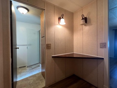 Discover comfort and convenience in this inviting 2-bedroom on Tucker Oaks Golf Course in California - for sale on GolfHomes.com, golf home, golf lot