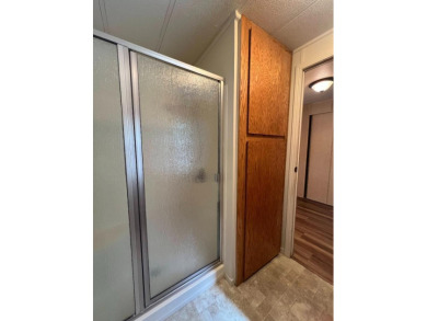 Discover comfort and convenience in this inviting 2-bedroom on Tucker Oaks Golf Course in California - for sale on GolfHomes.com, golf home, golf lot