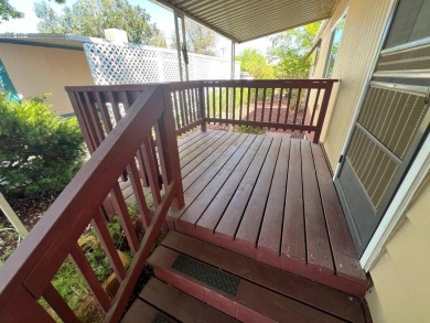 Discover comfort and convenience in this inviting 2-bedroom on Tucker Oaks Golf Course in California - for sale on GolfHomes.com, golf home, golf lot