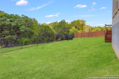 This spacious 3,681 sq ft energy-efficient home in Cibolo Canyon on TPC of San Antonio in Texas - for sale on GolfHomes.com, golf home, golf lot