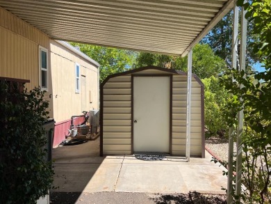 Discover comfort and convenience in this inviting 2-bedroom on Tucker Oaks Golf Course in California - for sale on GolfHomes.com, golf home, golf lot