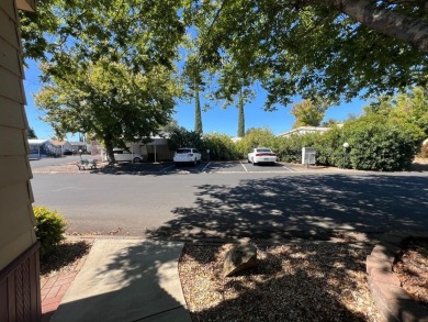 Discover comfort and convenience in this inviting 2-bedroom on Tucker Oaks Golf Course in California - for sale on GolfHomes.com, golf home, golf lot