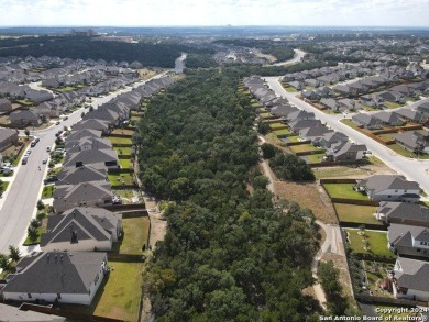 This spacious 3,681 sq ft energy-efficient home in Cibolo Canyon on TPC of San Antonio in Texas - for sale on GolfHomes.com, golf home, golf lot