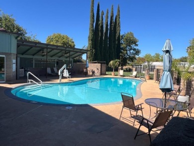 Discover comfort and convenience in this inviting 2-bedroom on Tucker Oaks Golf Course in California - for sale on GolfHomes.com, golf home, golf lot