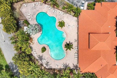 Welcome to this STUNNING two-story, three-car garage home in the on Valencia Golf and Country Club in Florida - for sale on GolfHomes.com, golf home, golf lot
