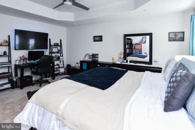 This spacious and beautifully updated 3-level single-family home on Lake Presidential Golf Club in Maryland - for sale on GolfHomes.com, golf home, golf lot