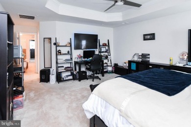 This spacious and beautifully updated 3-level single-family home on Lake Presidential Golf Club in Maryland - for sale on GolfHomes.com, golf home, golf lot