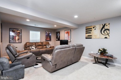 This spacious and beautifully updated 3-level single-family home on Lake Presidential Golf Club in Maryland - for sale on GolfHomes.com, golf home, golf lot