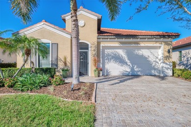Discover the epitome of luxury living in this stunning Key Largo on Sarasota National Golf Club in Florida - for sale on GolfHomes.com, golf home, golf lot
