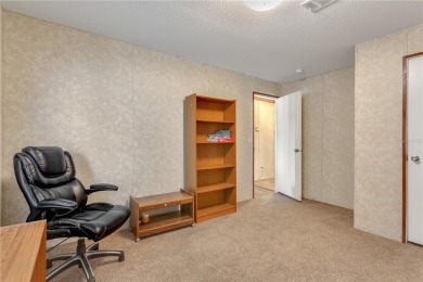 This practically NEW 2021 Built 3/2 Split plan home is located on Zellwood Station Country Club in Florida - for sale on GolfHomes.com, golf home, golf lot