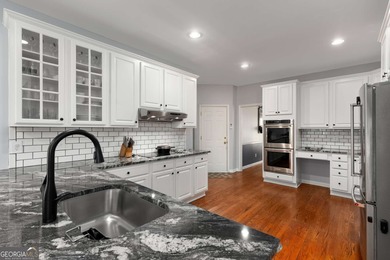 This updated and well-kept home is situated in the desirable on Canongate At Eagle Watch Golf Club in Georgia - for sale on GolfHomes.com, golf home, golf lot