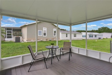 This practically NEW 2021 Built 3/2 Split plan home is located on Zellwood Station Country Club in Florida - for sale on GolfHomes.com, golf home, golf lot