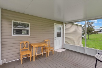This practically NEW 2021 Built 3/2 Split plan home is located on Zellwood Station Country Club in Florida - for sale on GolfHomes.com, golf home, golf lot