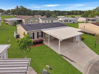 This practically NEW 2021 Built 3/2 Split plan home is located on Zellwood Station Country Club in Florida - for sale on GolfHomes.com, golf home, golf lot